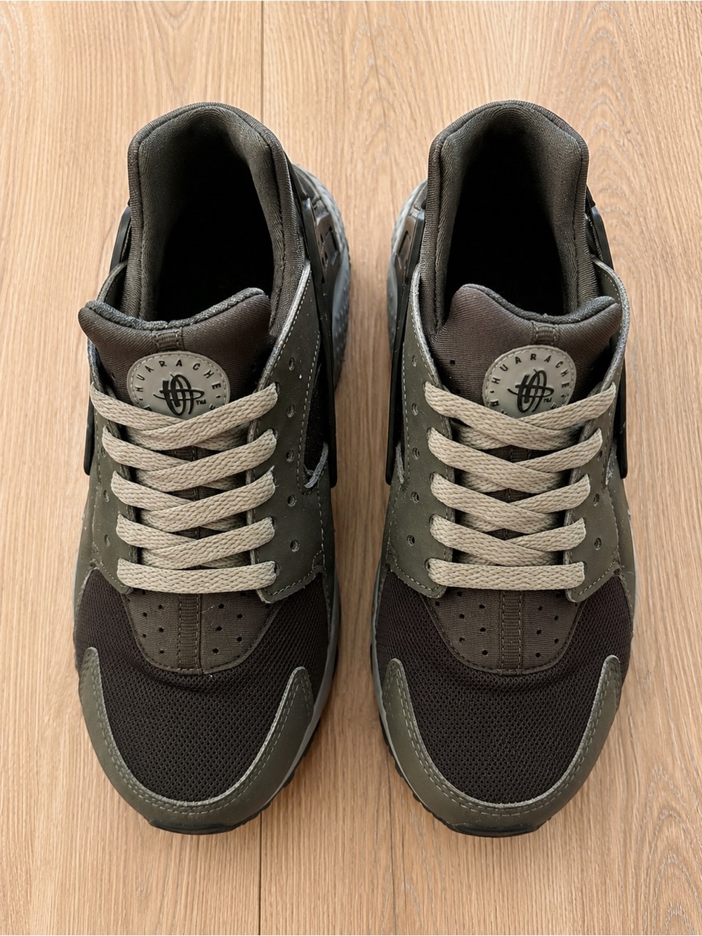 7Y (7M / 8.5W) Nike Huraches in Army Green.